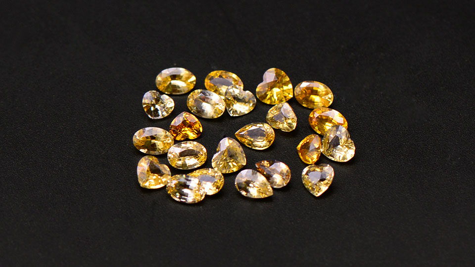 051克拉均重天然黄色蓝宝石统包货